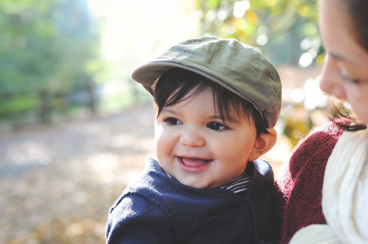 smiling baby wearing hat