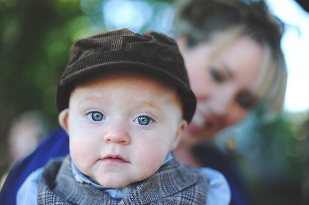 baby boy wearing a brown hat