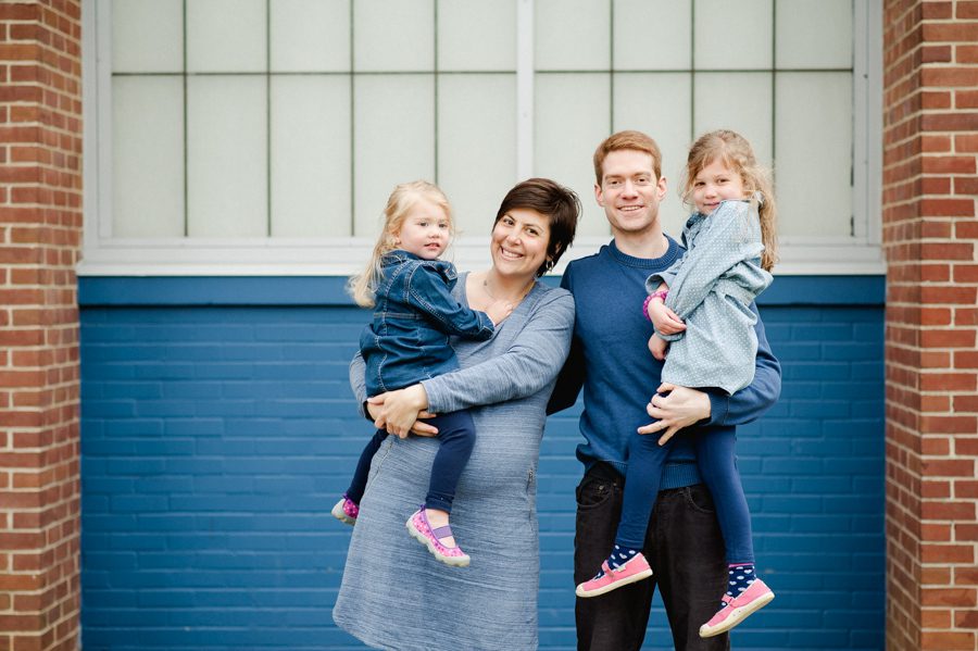 family-smiling-wearing-blue