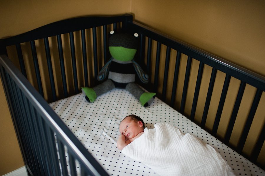 10-baby-in-crib-with-frog