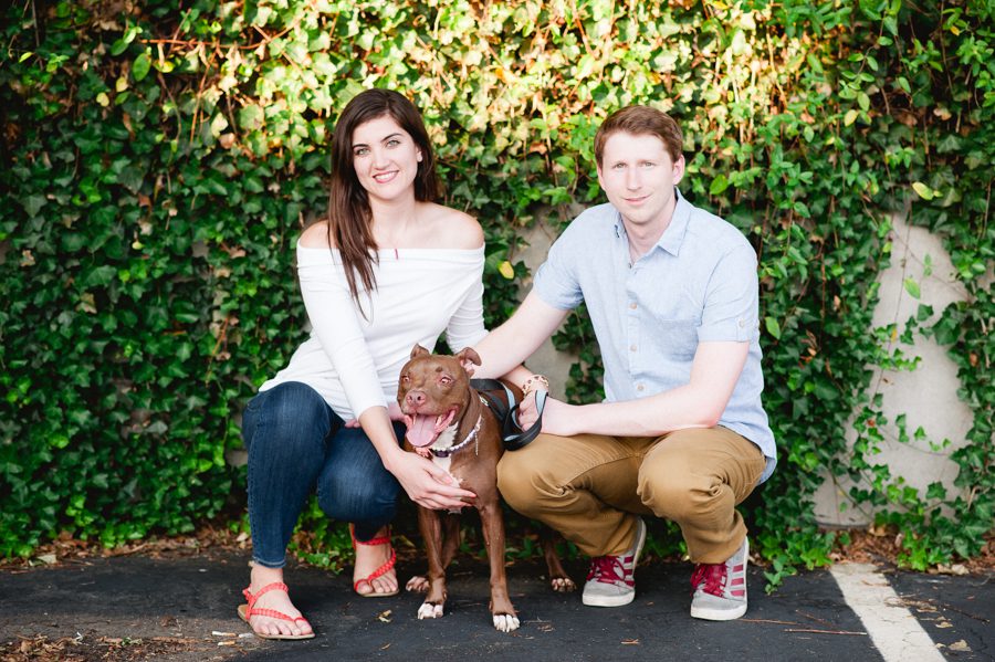 10-couple-with-dog-posing-in-front-of-ivy