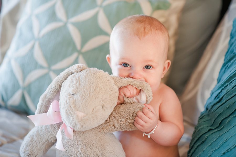 26-baby-girl-chewing-stuffed-bunny