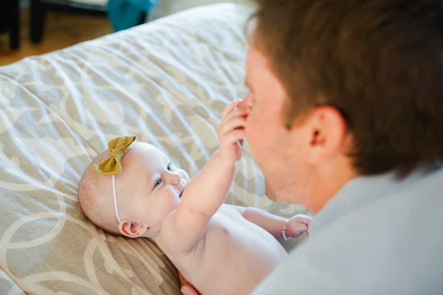 27-baby-girl-reaching-for-dads-nose