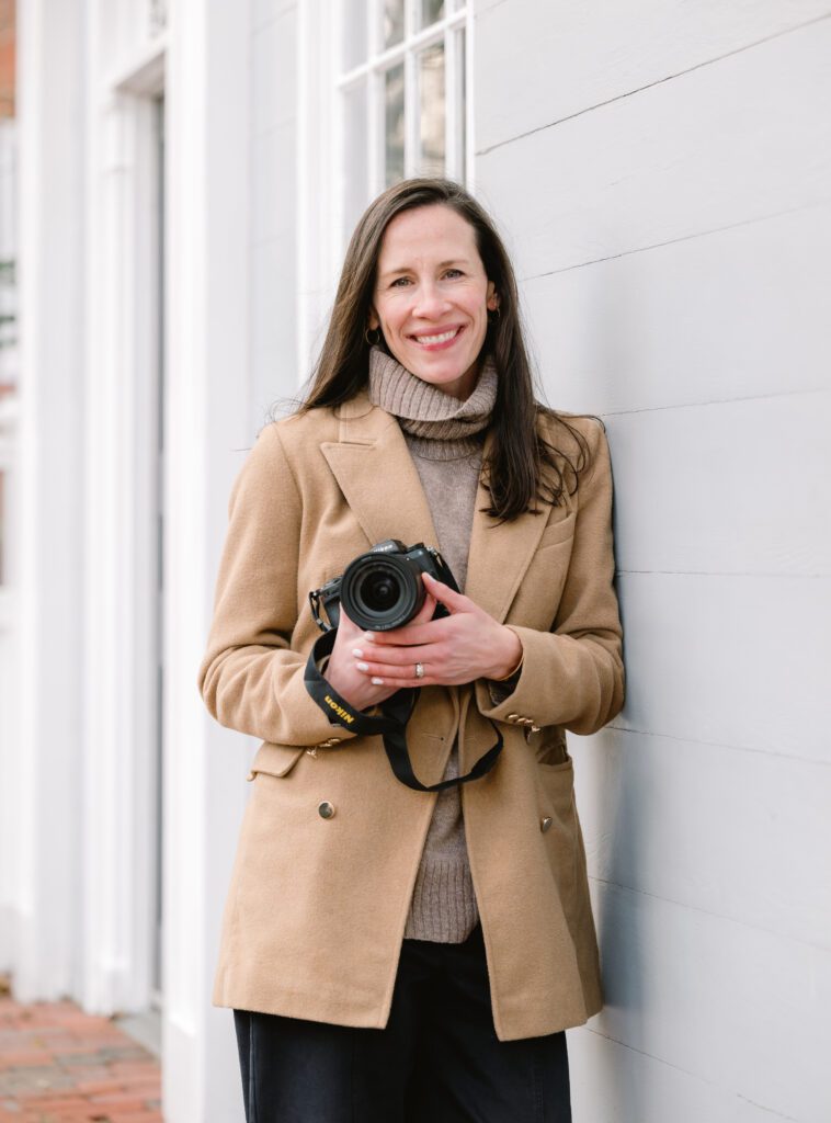 Philadelphia photographer holding camera