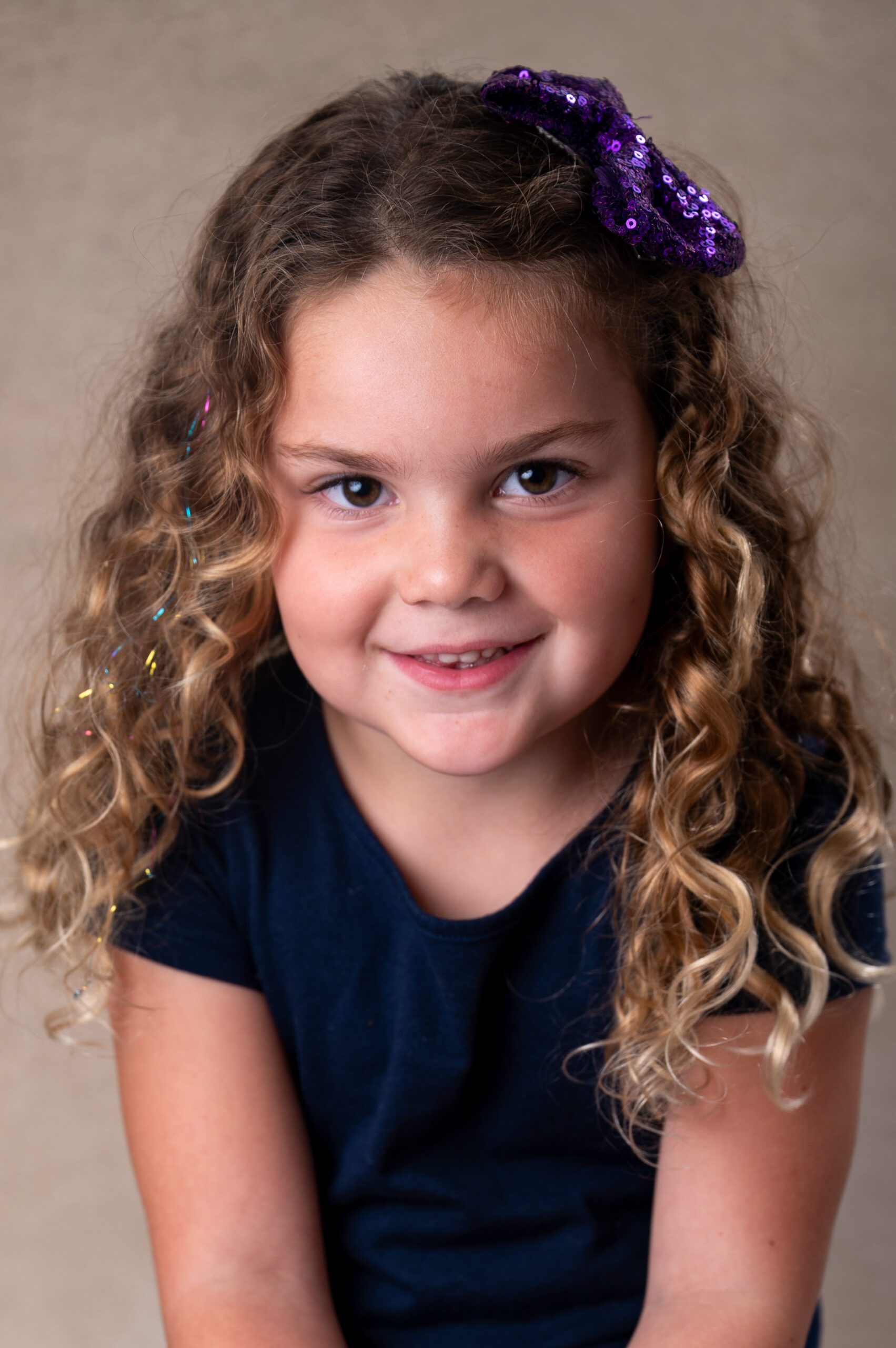 color school portrait of smiling preschool girl